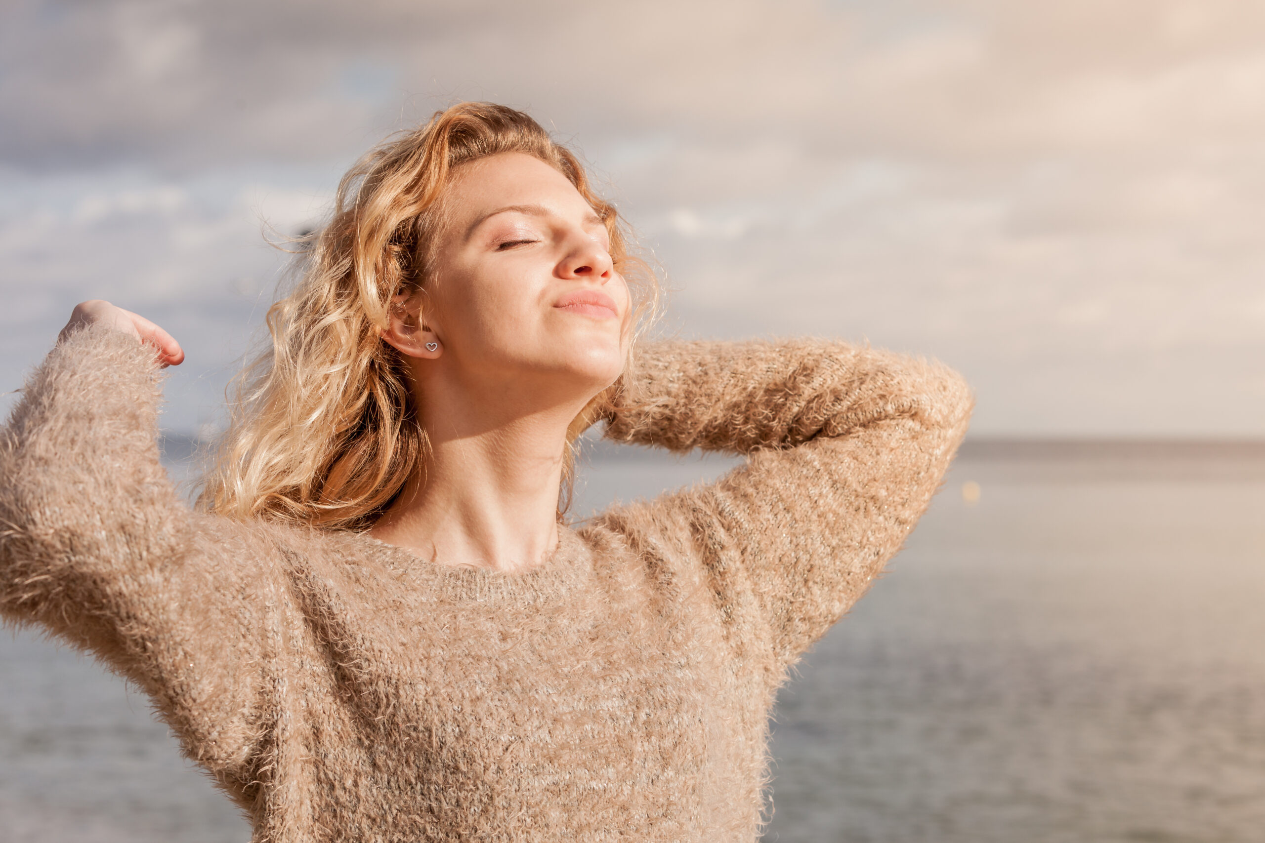 Woman basking in the sun getting the benefits of vitamin D